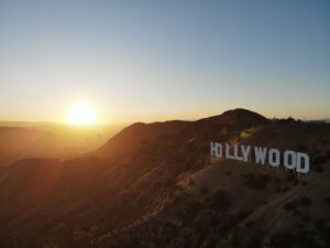 Hollywood sign on the hills above Los Angeles at sunset